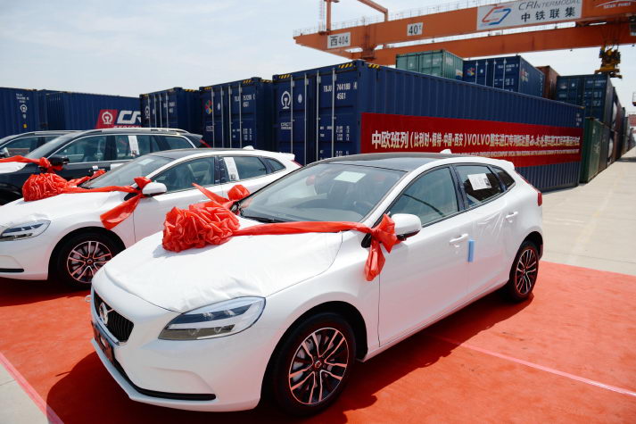 Imported Volvo cars arrive at a railway station in Xi'an, northwest China's Shaanxi Province, on June 13 (XINHUA)